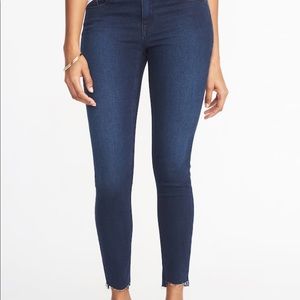 Mid-rise Rockstar super skinny step hem jeans. 12